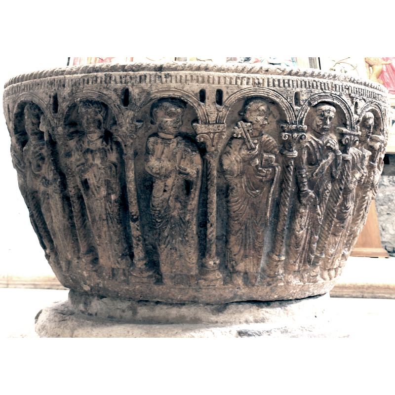 on the southwest side of the basin [NB: orientation is approximate] -- in this image the two arches on the left house the Annunciation scene, Gabriel in the leftmost arch, Mary in the next one -- four other figures are seen here in the other four arches; the only one with a well-defined symbol is Peter, charged with the keys