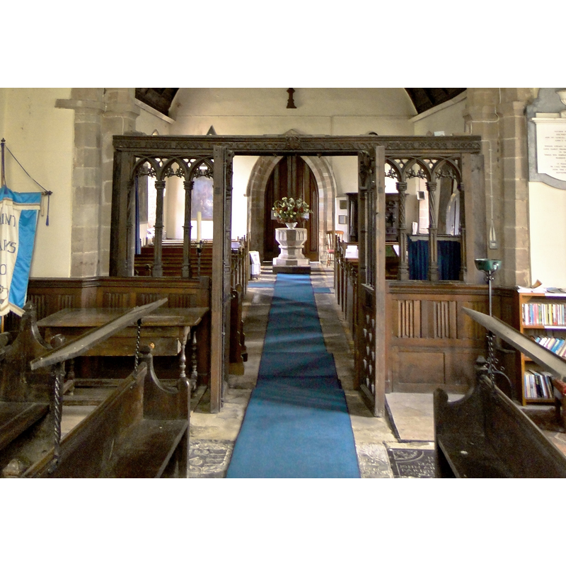 viewed through the chancel screen, at the west end of the nave