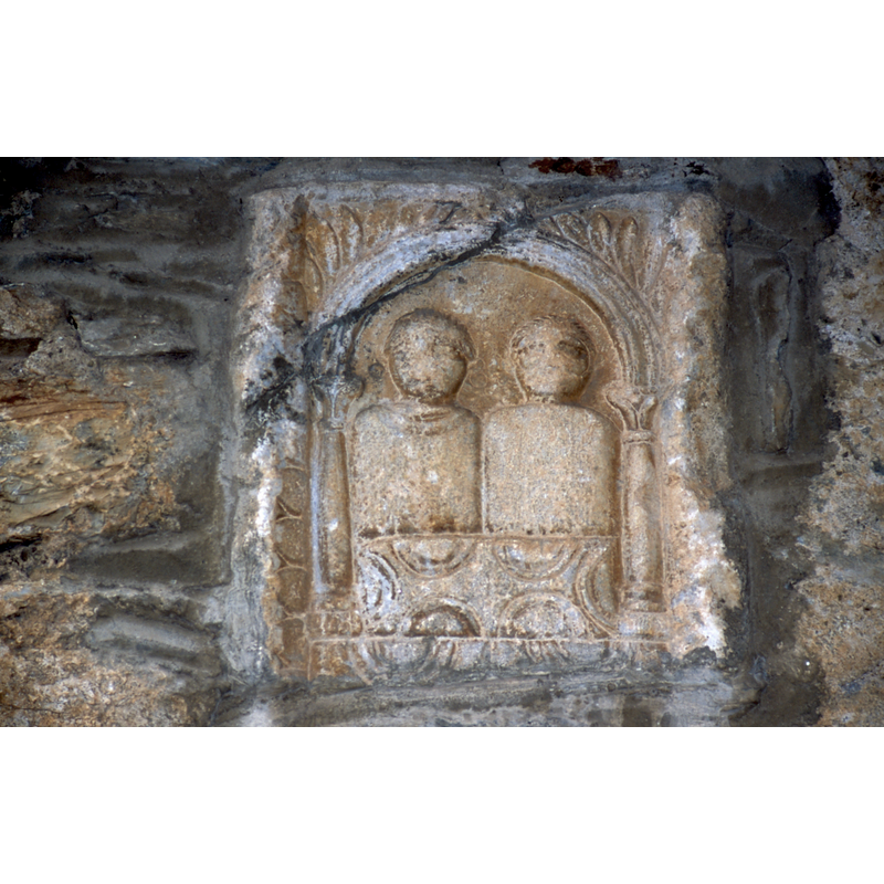 Roman 'cippe' to the left of the door