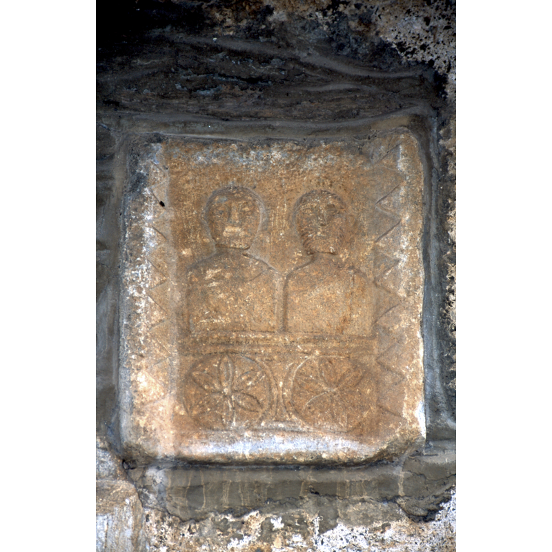 Roman 'cippe' by the south doorway