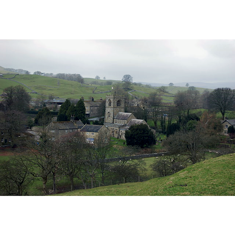 Source caption: "Burnsall Church St Wilfrid's Church in the village of Burnsall serves the villages of Appletreewick, Burnsall, Hartlington, Skyreholme and Thorpe. The patron saint is Wilfrid whose feast is 12th October. It is said that St Wilfrid visited Burnsall and preached from the banks of the River Wharfe and that he baptised converts to Christianity. Archaeological surveys show that there has been a church on the site since the 9th century.:"