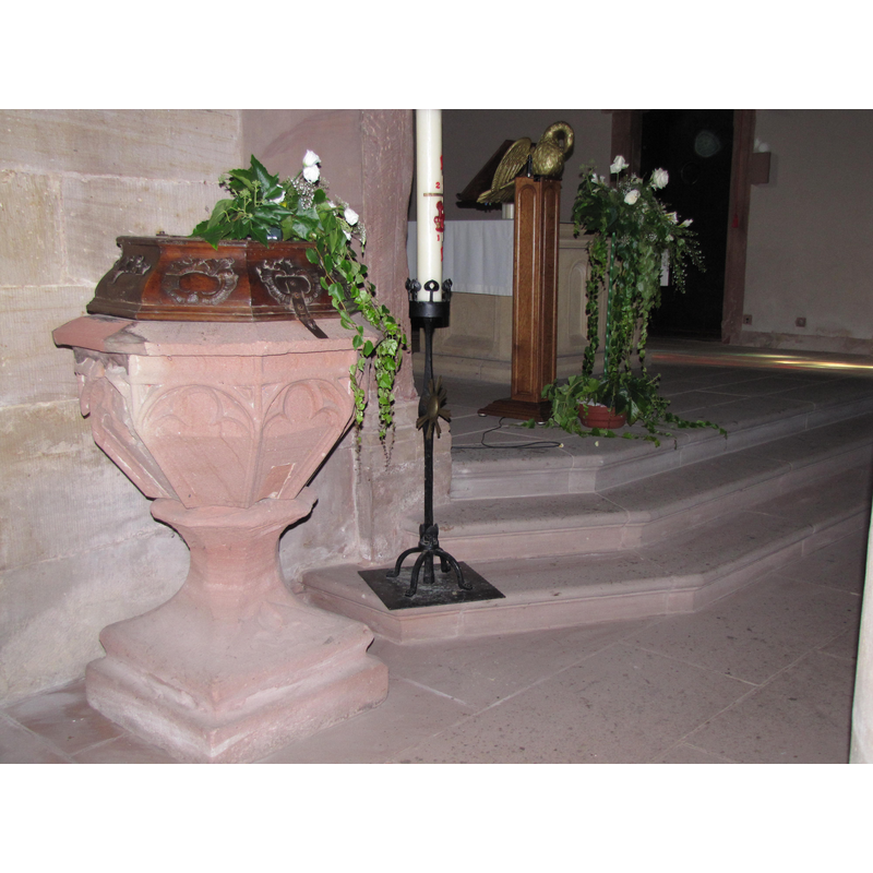 at the east end, by the north side of the chancel arch [not its original location]