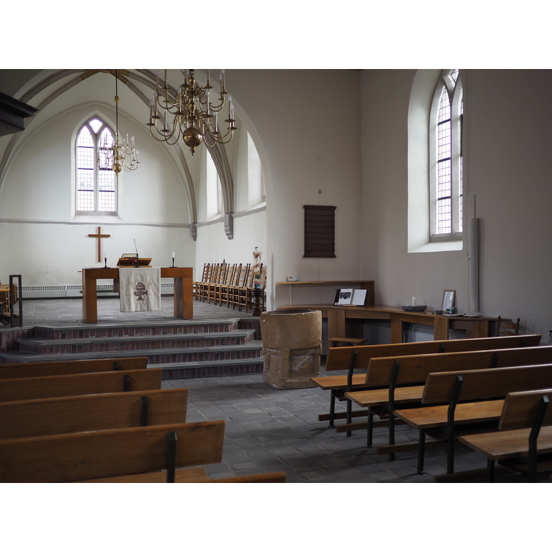 the font in May 2015, having been moved from its previous location by the pulpit [not its original location]