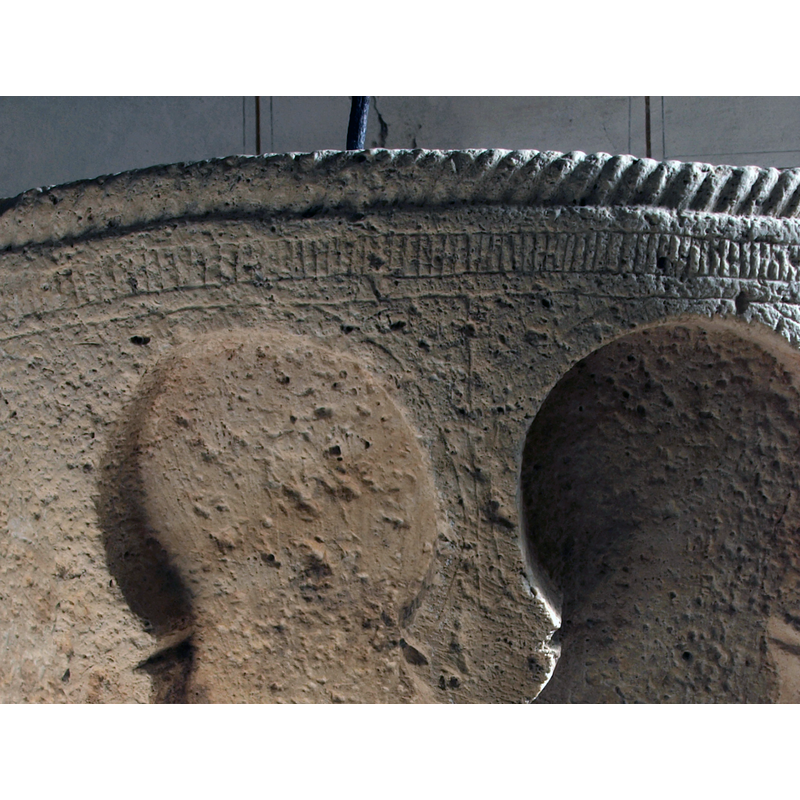 between the rope moulding and the top of the archesvery short; all around