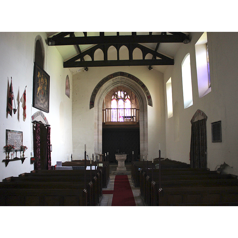 with the font at the far [west] end of the central aisle