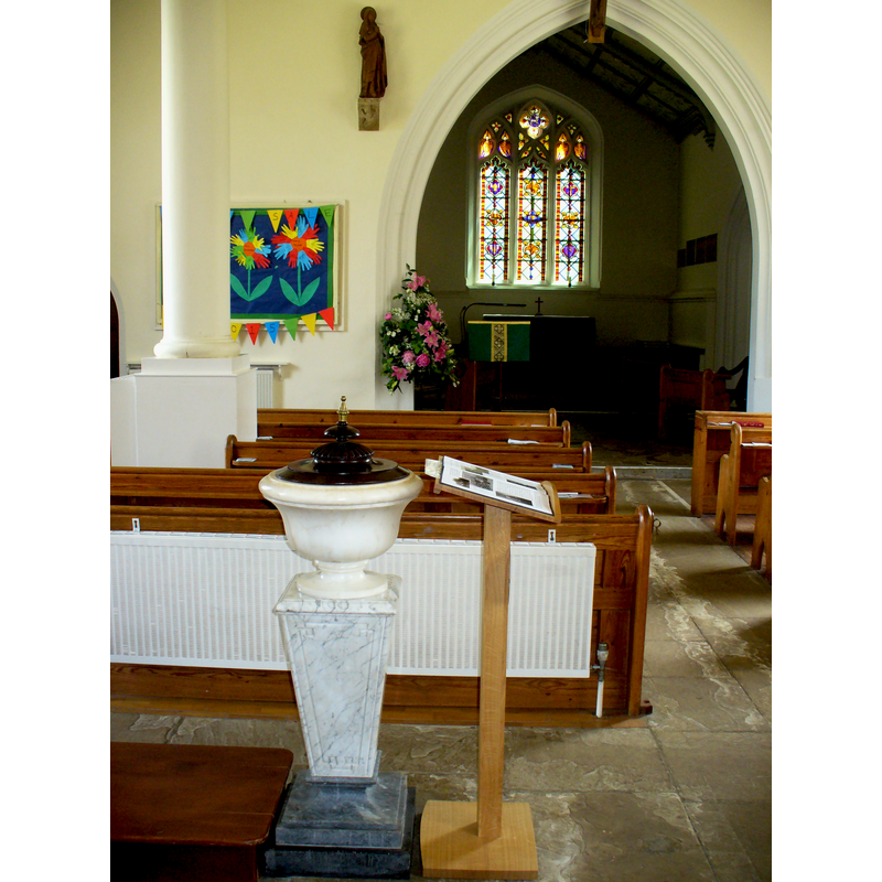 showing the modern urn-shaped font