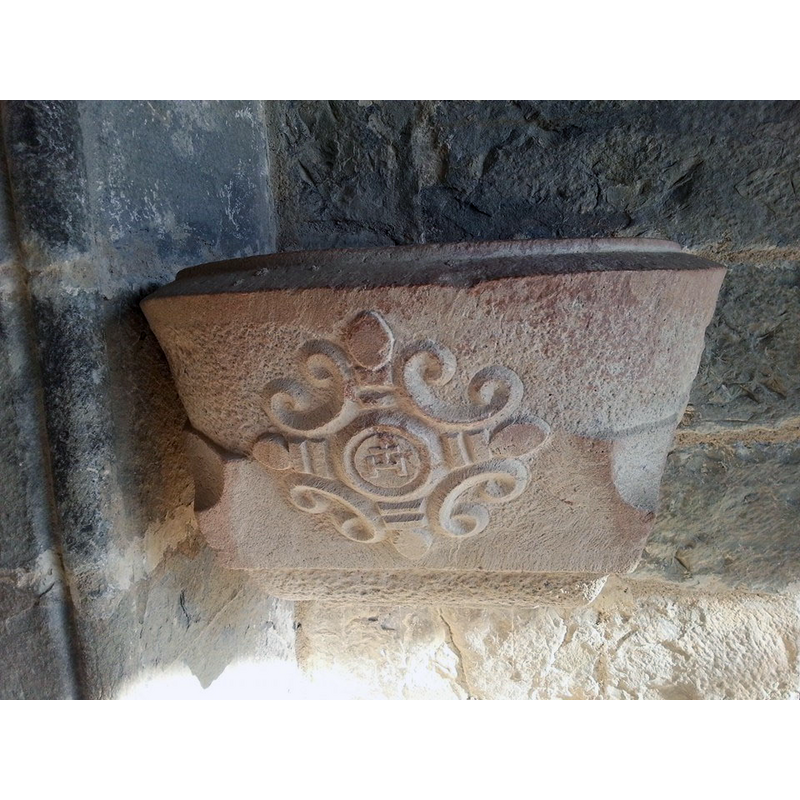 wall-mounted by the entrance