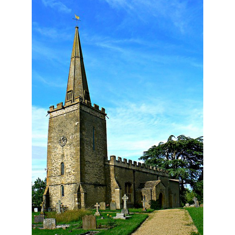 Source caption: "The rather austere 12th century church is listed Grade I [...] The tower was added in the 13th century with the spire being added in 1625. The spire was struck by lightning in 1852 and was rebuilt. However, the pinnacle of the spire subsequently decayed and was replaced with a glass-fibre pinnacle in 1968."

Source caption: "The octagonal font is 15th century with a Jacobean cover."