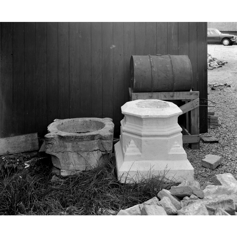 the photograph shows the disused basin, together with the white-washed base of the pulpit, in 1966