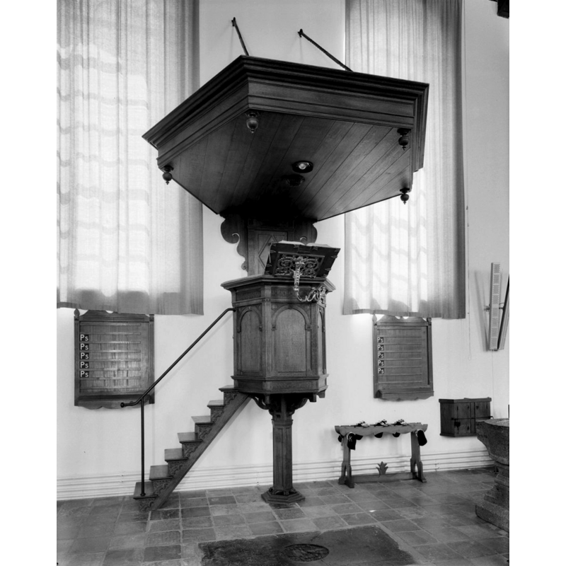 the pulpit with its new base in 1982; note that the old base of the pulpit is now supporting the restored basin of the font, partially visible on the right