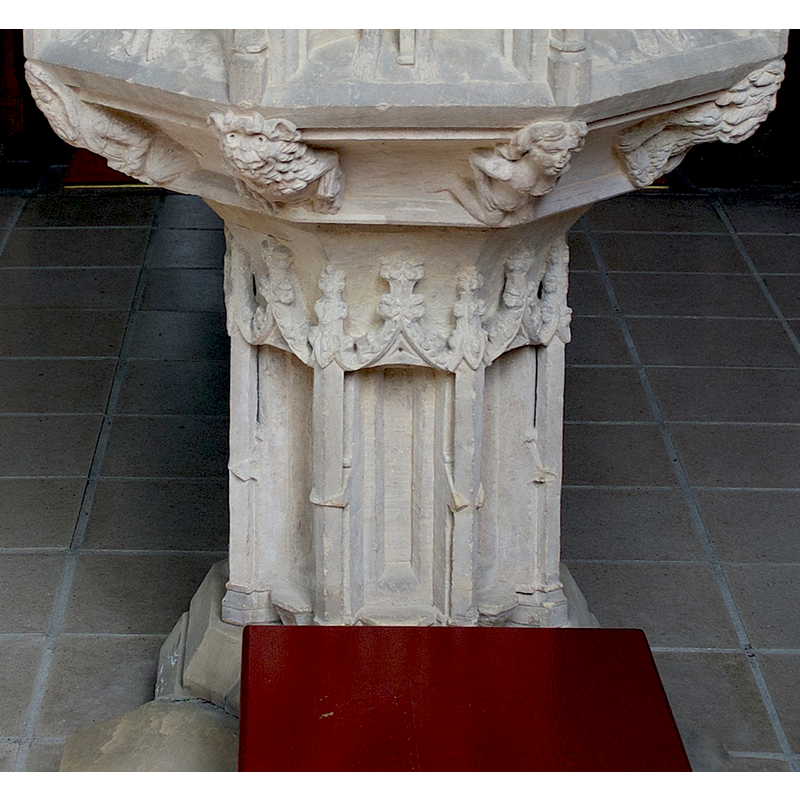 one on each side of the stem of the base