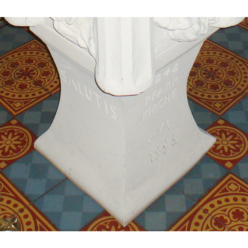 the modern base dated by an inscription
