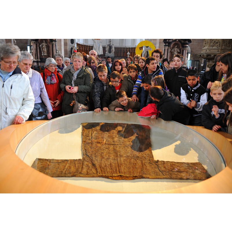 purported to be Christ's seamless robe/ tunic -- Source caption: "Pilgrims and visitors view the “Holy Robe,” a tunic reportedly worn by Jesus, at the Trier Dom Cathedral here April 25. This year marks the 500th anniversary of the first public appearance of the robe, which was last on display at the cathedral in 1996. Hundreds of thousands of people from around the world are expected to visit to see the relic, which is on display until May 13."