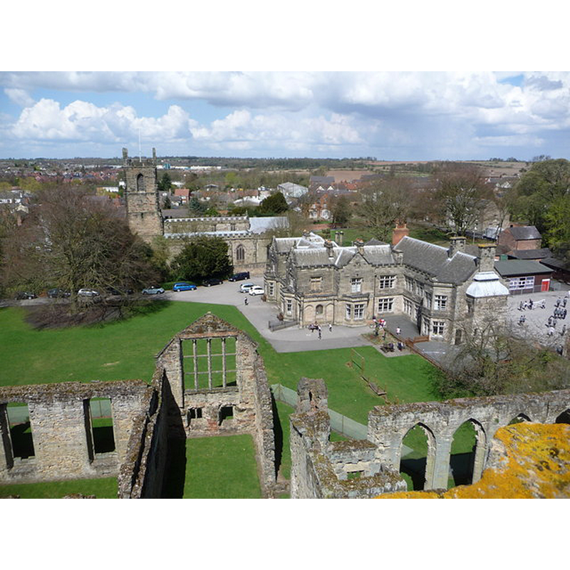 Source caption: "Ashby-de-la-Zouch: St. Helen’s church from the castle. Looking from the top of the castle tower, across other castle buildings towards the parish church of St. Helen. Also prominent is Manor House School, an independent school housed in a Victorian manor house."