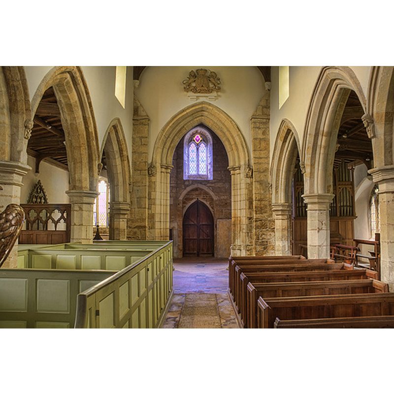 the tip of the font cover can be seen in the south aisle, through the last arch of the south arcade