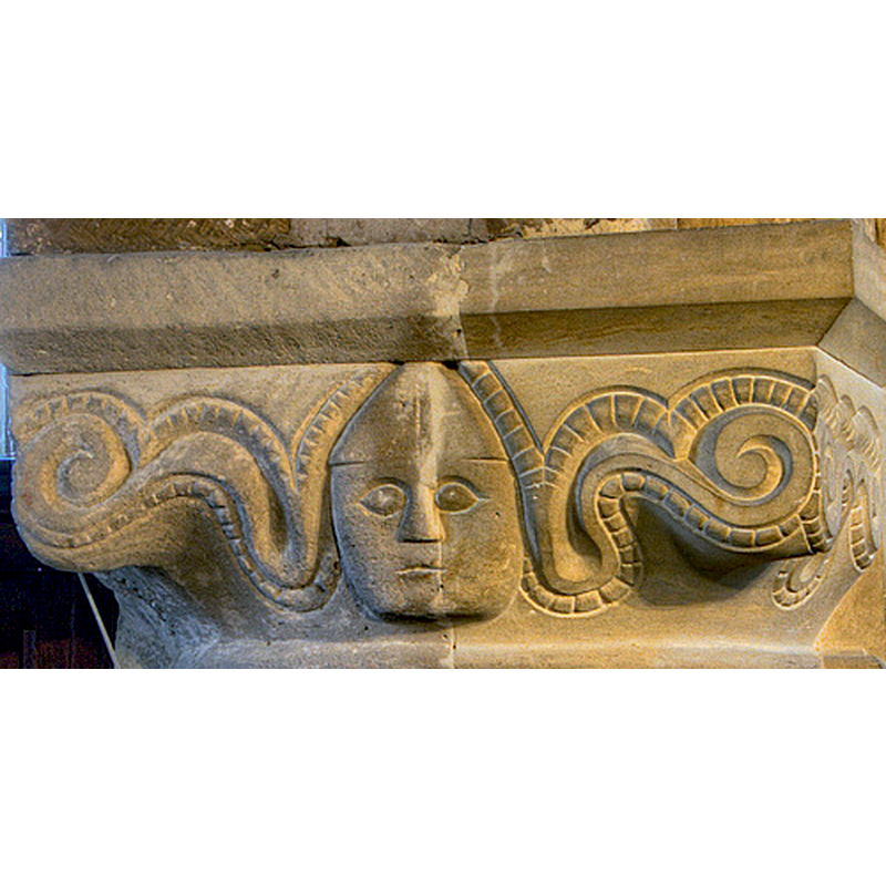 Source caption: "Some of the fine carvings on the Late Norman arches at Bringhurst" [NB: the left half is original; the right half clearly a reconstruction]