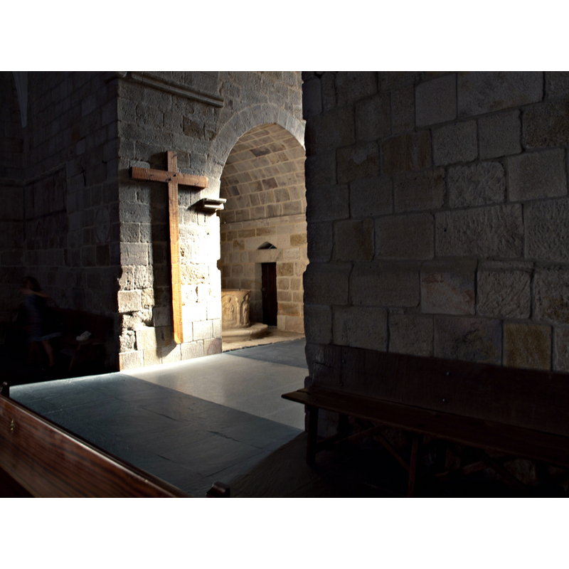 the baptismal font in the background