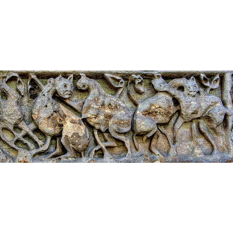Source caption: "Saxon carvings from the Lady Chapel [...] and south aisle [...] They originally were on the inside and outside walls of the previous Saxon Minster church."