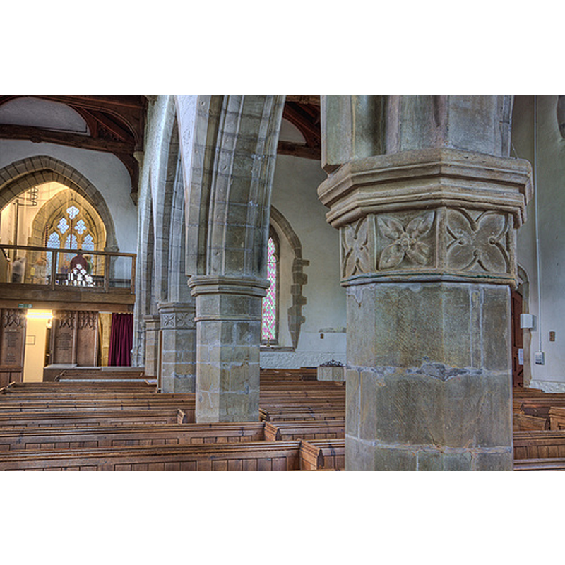 the top of the font is visible across the north arcade, at the west end of the north aisle
