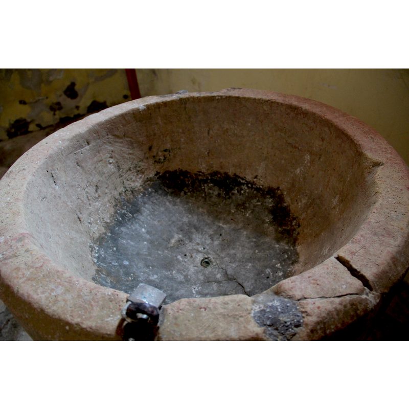 the painted and very battered basin
