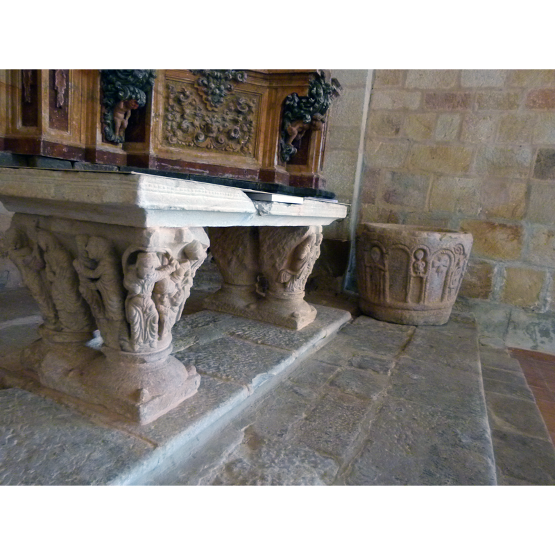 at the east end of the nave, to the right [south of the altar]