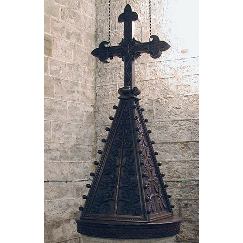 described in Newman & Pevsner as "large, coarse cover of 1872" [cf. FontNotes]