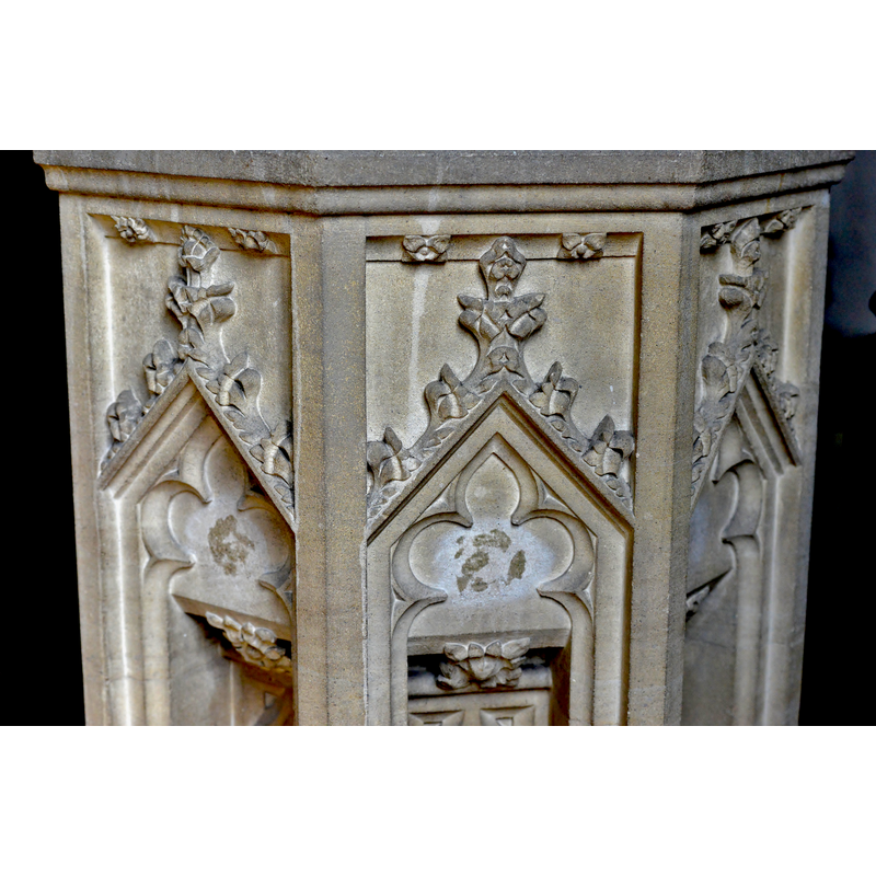 the modern font; notice inside the arch-heads: something was glued/cemented there but has been removed or fallen off