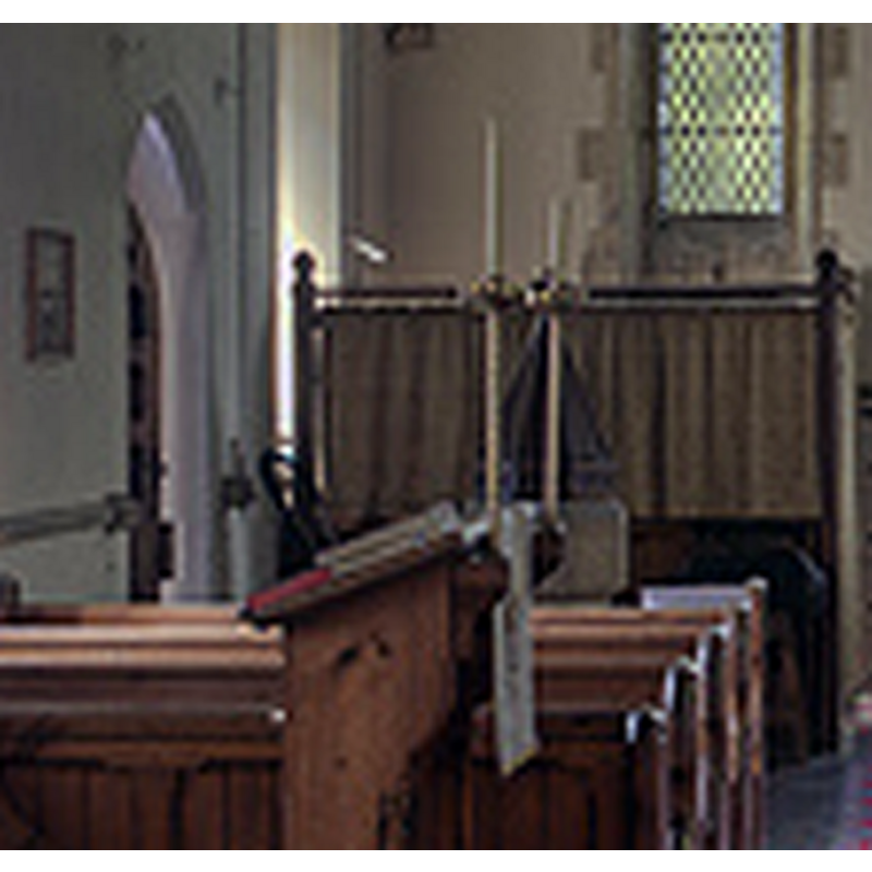 at the west end of the nave, by the south doorway