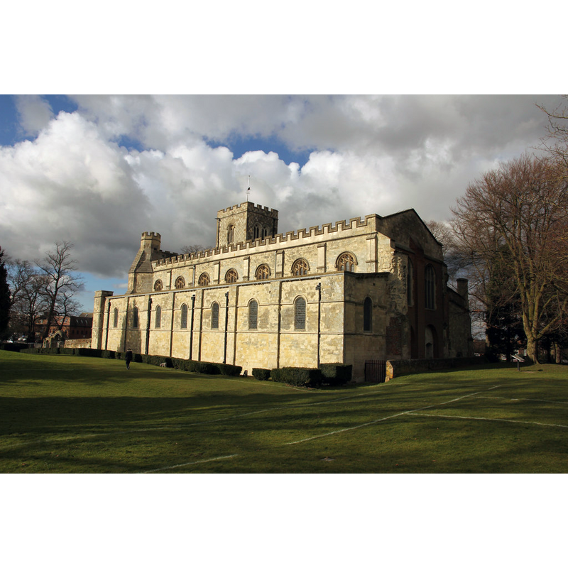 Source caption: "Dunstable Priory was an Augustinian Priory founded in 1132 by King Henry I with the Romanesque church mostly surviving a dramatic storm that destroyed much of the Priory. The west front was rebuilt in the 13th century in the Early English style. It was dissolved in January 1540 and the nave was blocked at the rood screen to create a much smaller parish church of St.Peter. The monastic buildings were robbed for building stone and only the church and a gateway survive."