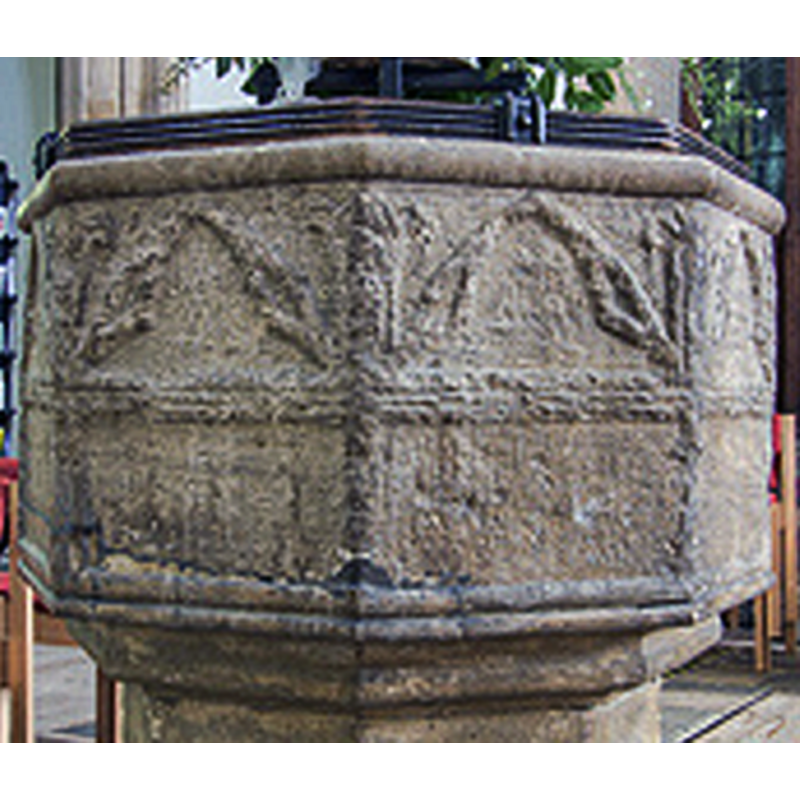 much eroded; notice also the damage and repair on the lower left side