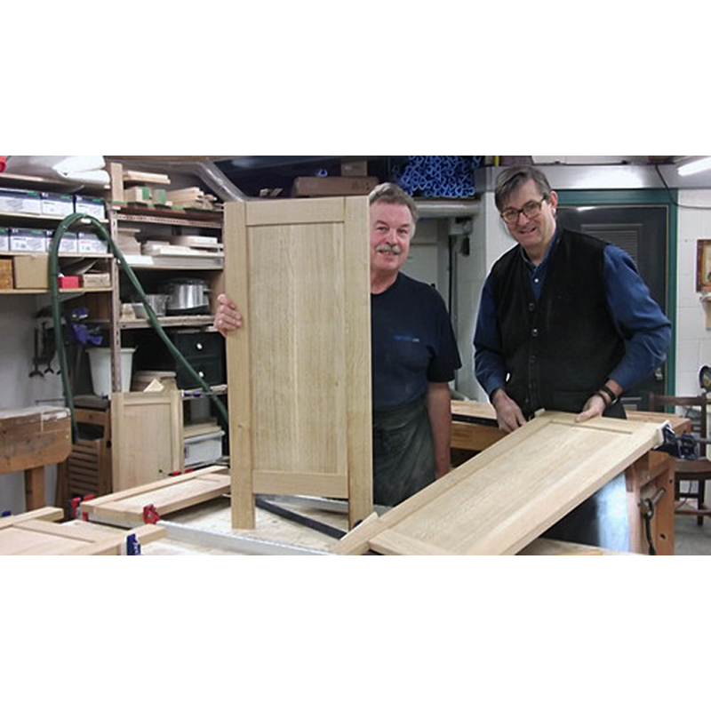 making a new font from old pews?  old pews being turned into wooden panels that will make up the base or supporting structure for the new font