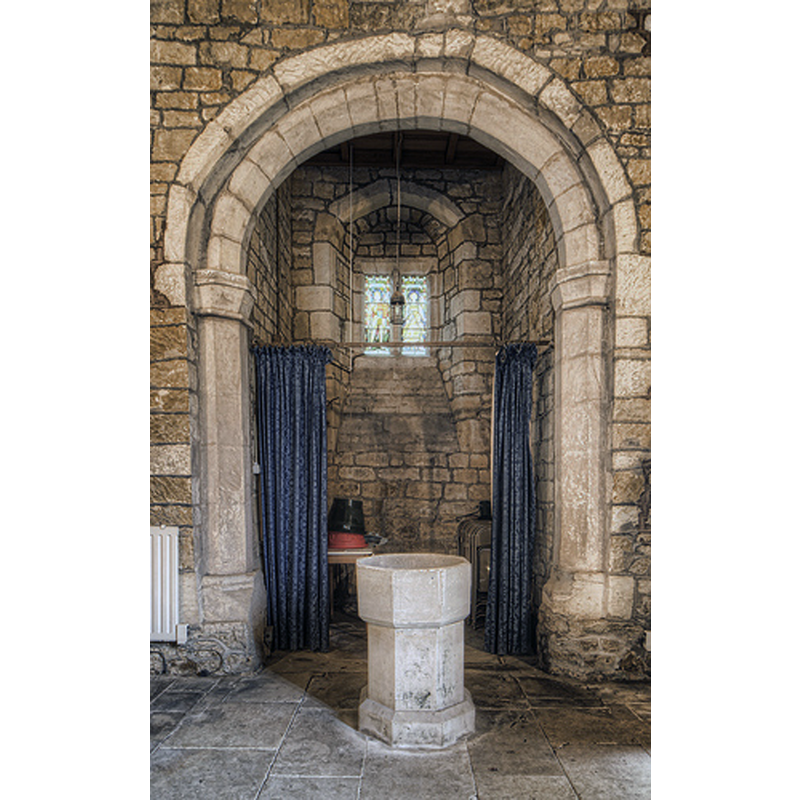 just east of the tower arch