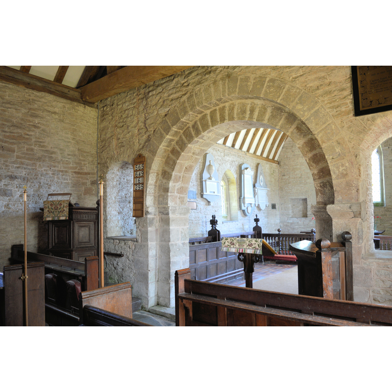 Source caption: "St James, Shipton. The Norman chancel arch."