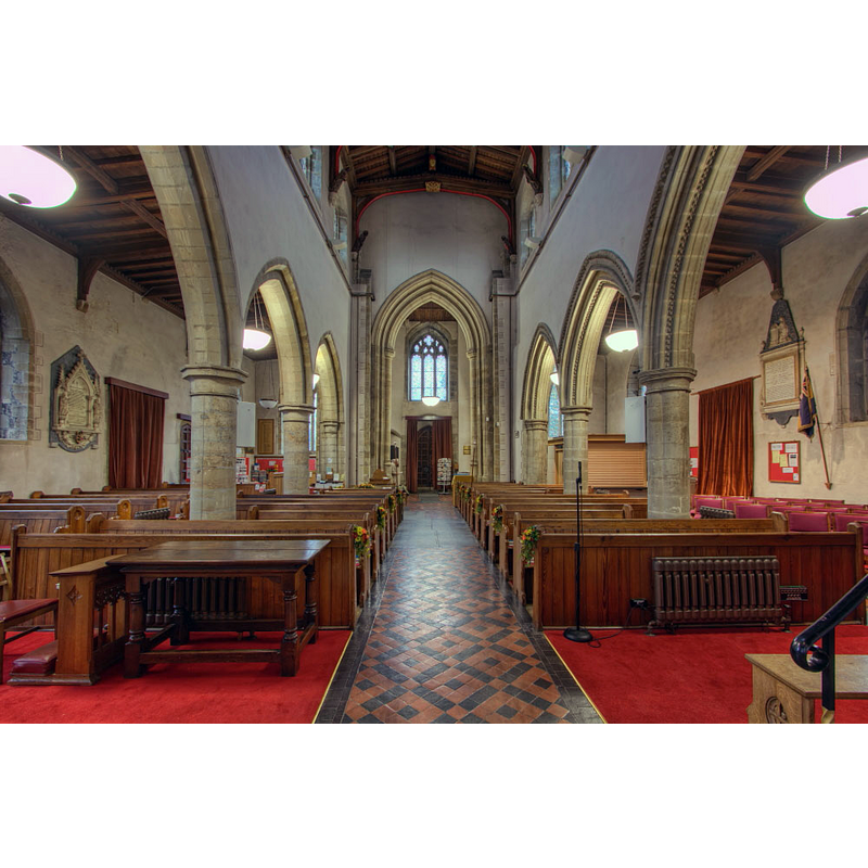 the top of the wooden cover is visible at the far [west] end of the left [south] bank of benches in the nave, towards the south arcade