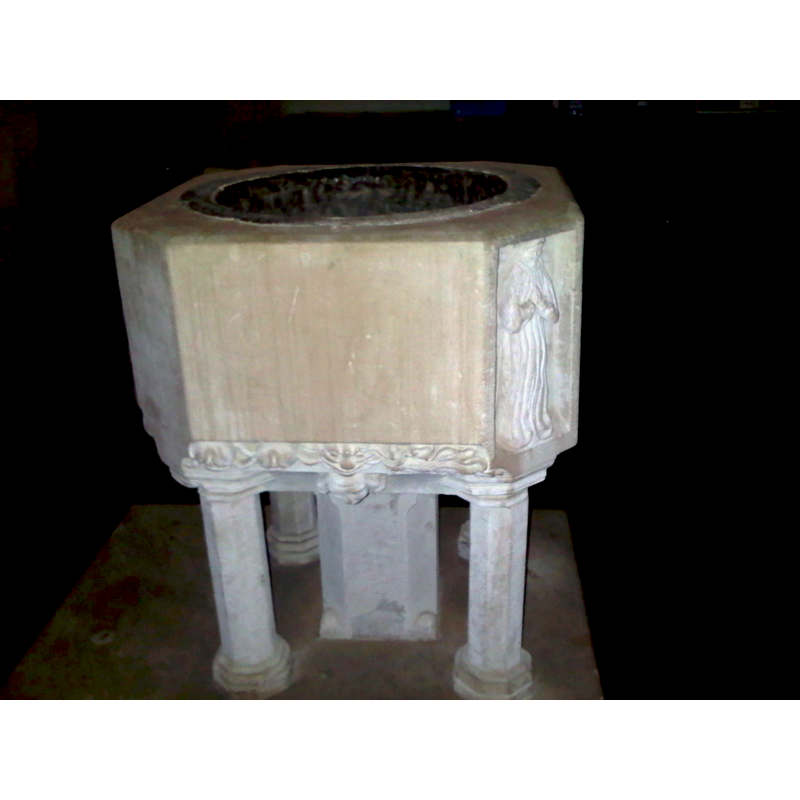 the font probably 14th-century, but believed to have been re-carved in the 17th century
