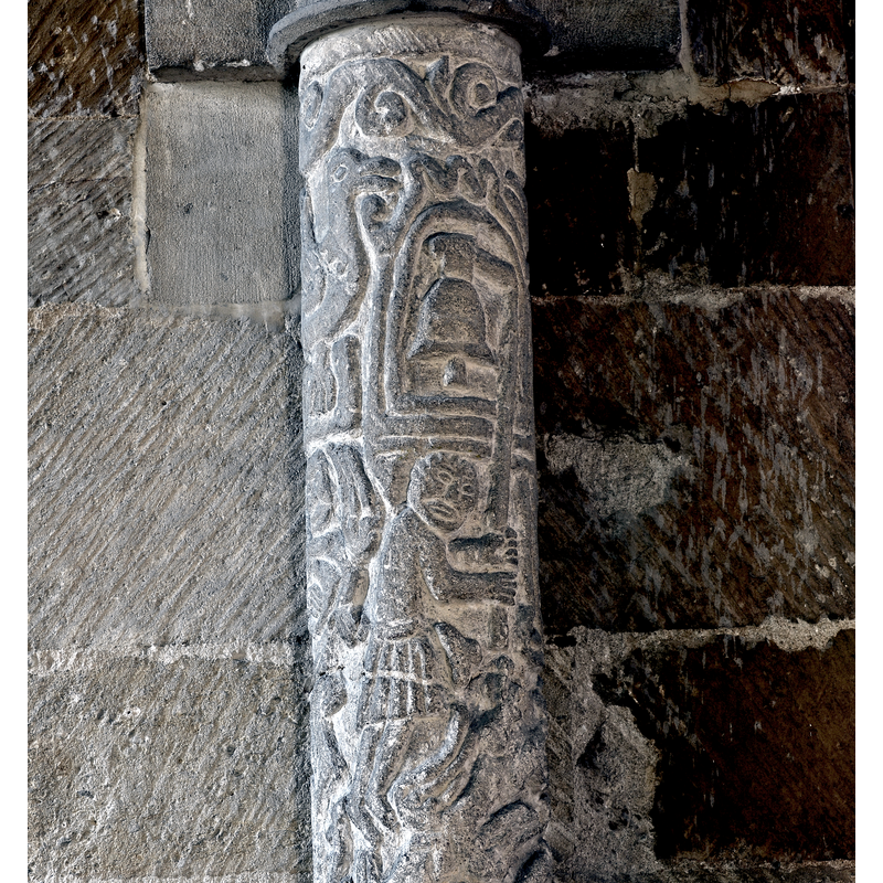 Source caption: "Stoke Dry: St. Andrew's Church: Detail of the south chancel pier. At the top of the pier is what is claimed to be the first carving to represent bell ringing in an English church."