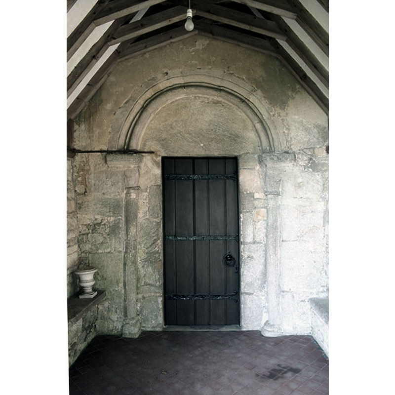 Source caption: "Plain Norman south doorway to St.Nicholas' church."
