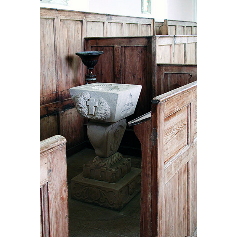 the two fonts inside one of the north pews; the smaller bracket-font is above and at the back
