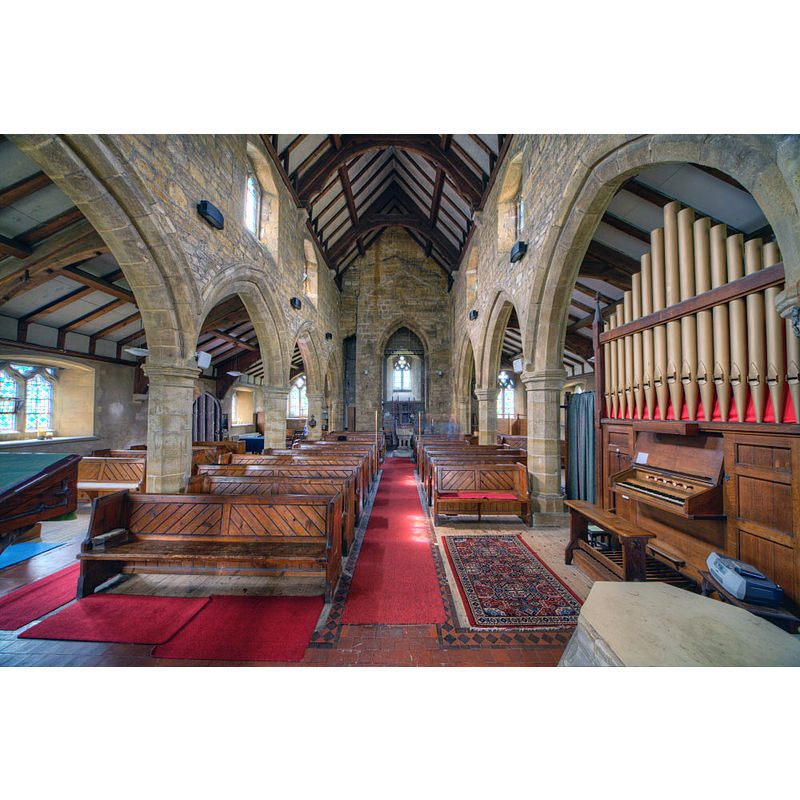 with the font and cover visible at the far end, centre aisle