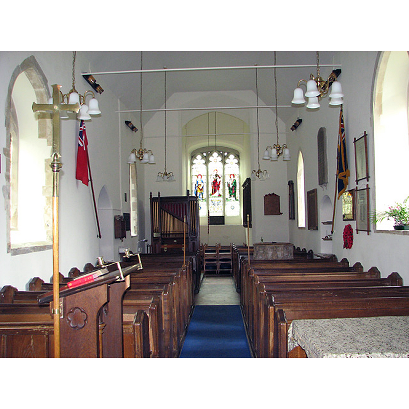 the top of the font is visible in the right [north] bank of benches, towards the back
