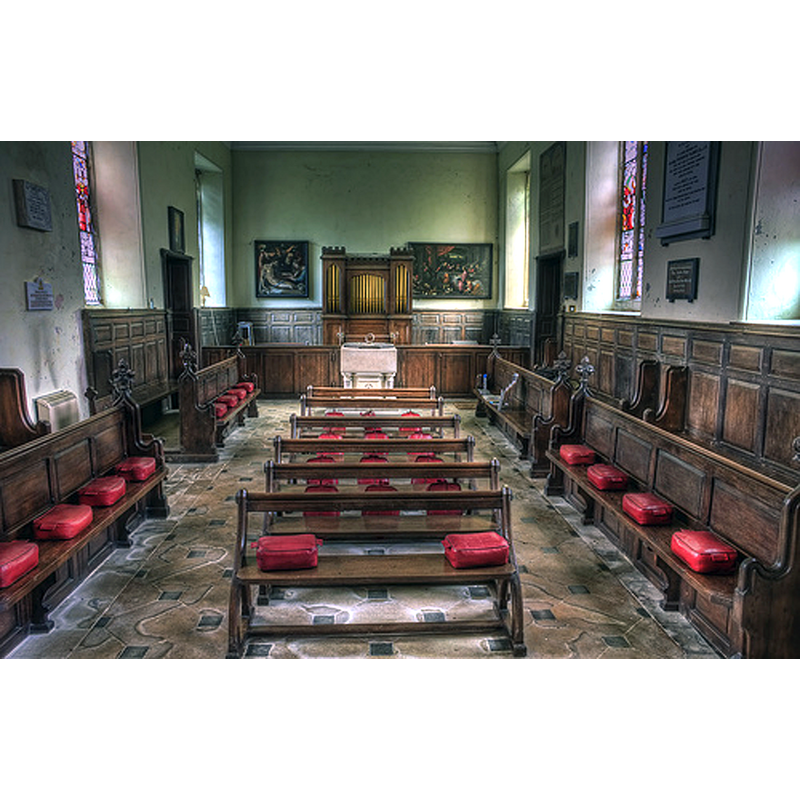 the modern font at the back of the nave
