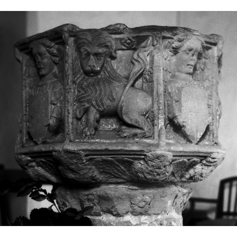 the shields are now blank; they may have had emblems painted or carved originally