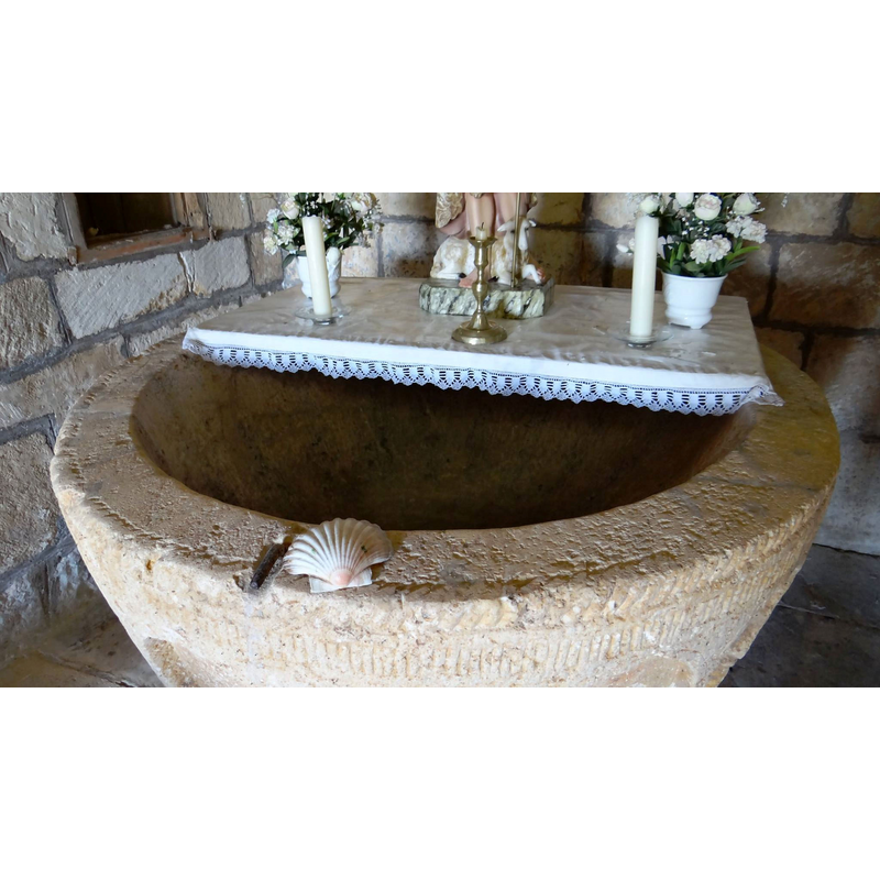 notice the metal rod in the upper rim. an anchoring spot for an earlier font cover