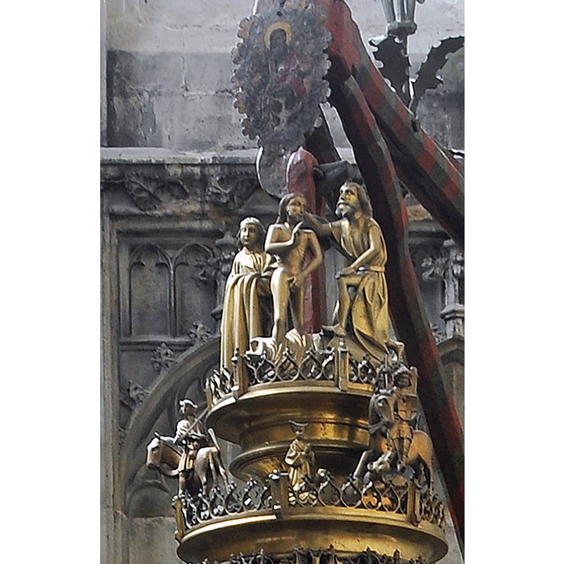 in the middle volume of the lid, one of three equestrian saints