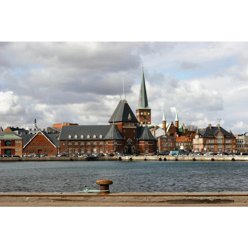 Source caption: "Toldboden, Aarhus Domkirke and Katedralskolen seen from "Dokken" (an old shipyard), Aarhus, Denmark"