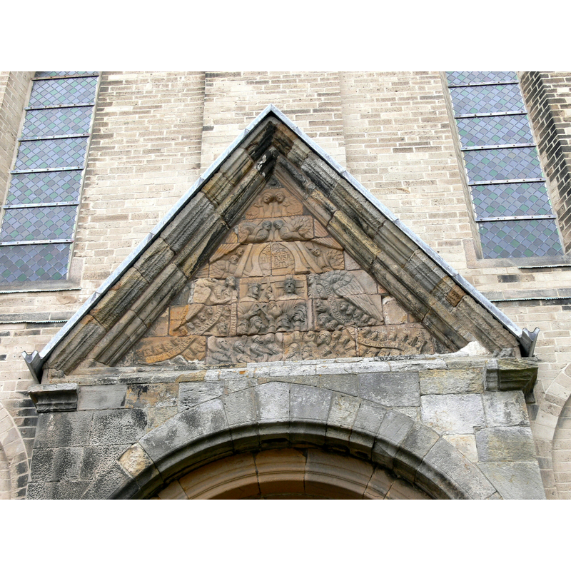 Source caption: "Ribe cathedral. Gable ( 13th century ) of the "cat´s head portal""