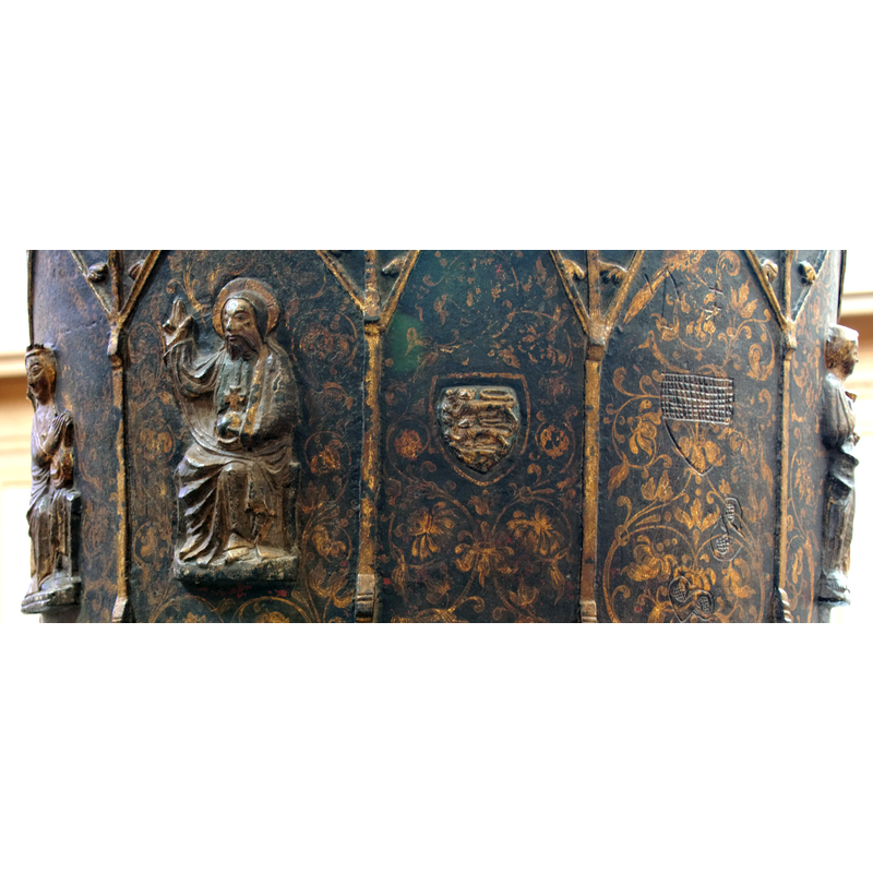 seated to the righ of a crowned Mary