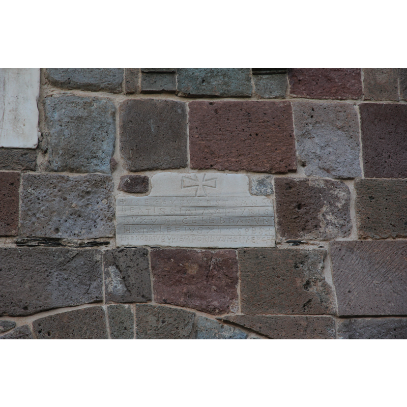 located just above the south portal, the arch of which is partially visible at the bottom of the image