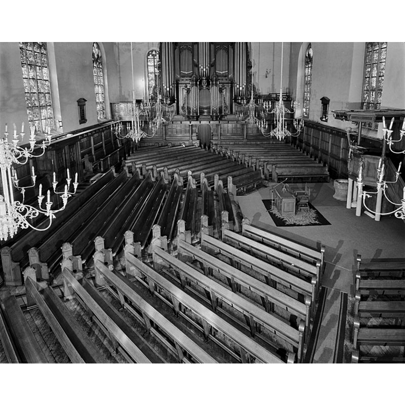 the font is visible at the foot of the pulpit, on the north side
