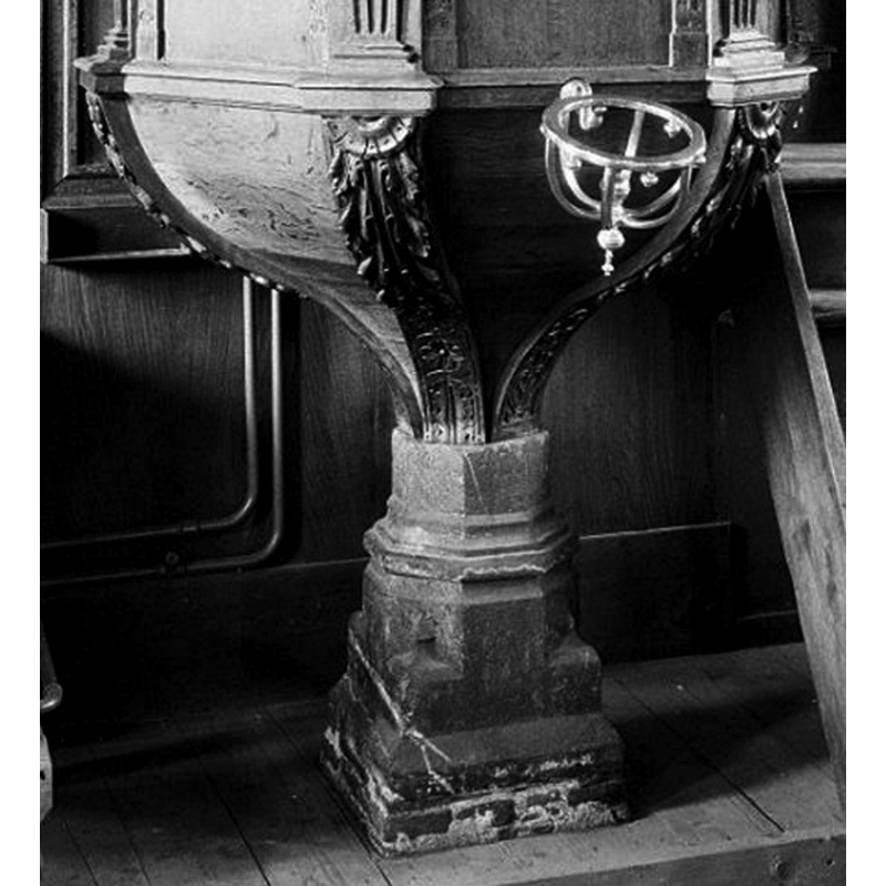 the stone base of the pulpit is said to be from a former 16th-century font